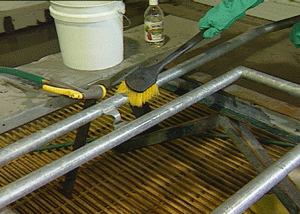 Cleaning the steel surface with a brush