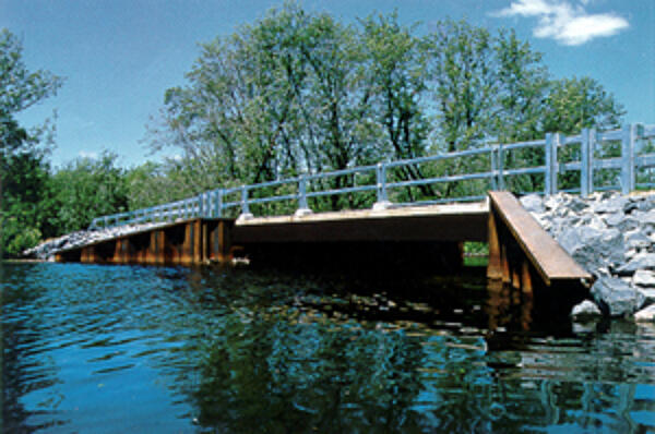 weathering steel girders with hot-dip galvanized rails